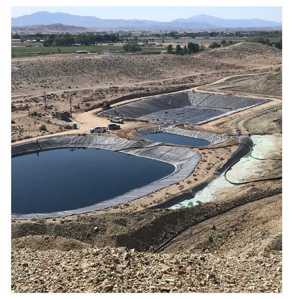 The large pond in the foreground is the existing Phase IV Slot Pond. The small pond in the middle is the recently completed and commissioned Slot Sediment Pond, and the empty lined pond in the upper right is the new Slot 3 Pond. The Slot Sediment Pond and Slot 3 Pond will become part of the new FMS once fluids are transferred from the current FMS.